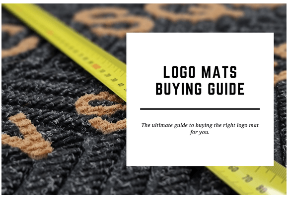 A logo mat is shown close up with a measuring tape over it. The blog header reads Logo Mats Buying Guide.