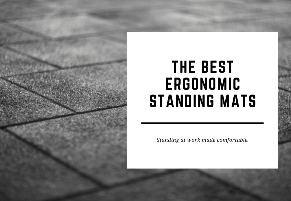 Ergonomic standing mat tiles are shown close-up in the background. The blog header reads Ergonomic Standing Mats.