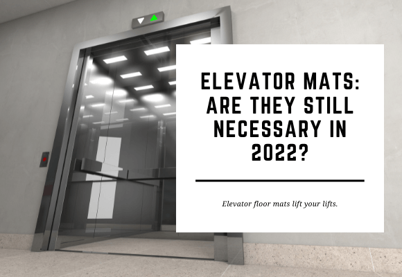 An elevator with open doors is sparkling in the background. The blog header reads Elevator Mats: Are They Still Necessary in 2022?
