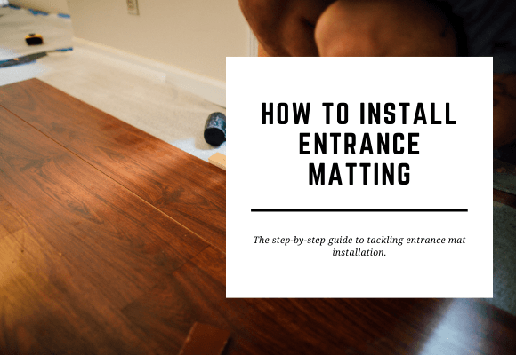 A man installs wooden flooring. The blog header reads How to Install Entrance Matting.