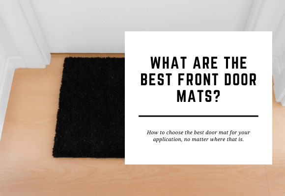 A black door mat sits inside a white doorway. The blog header reads What are the Best Front Door Mats?