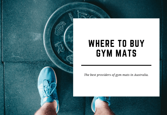 A pair of feet stand over a weight plate on a gym floor mat. The blog header reads Where to Buy Gym Mats.