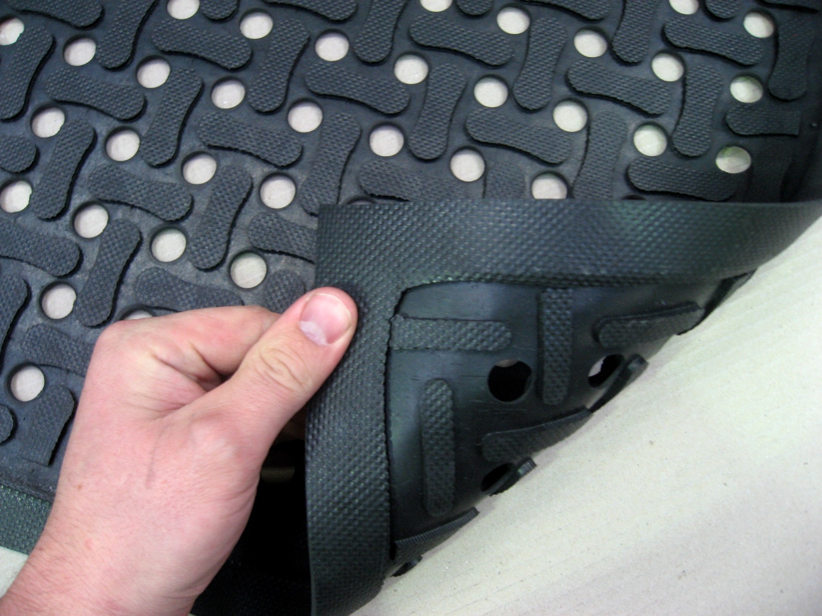The rubber underside of a non slip mat.